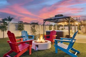 Backyard fire pit and gazebo at the Indoor Playground home