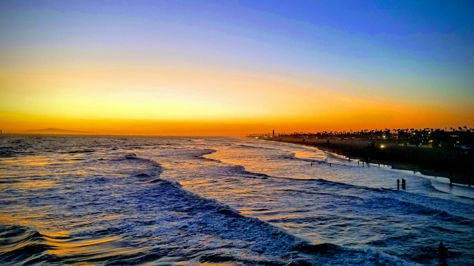 A coastal sunset viewed from the pier in Southern California.