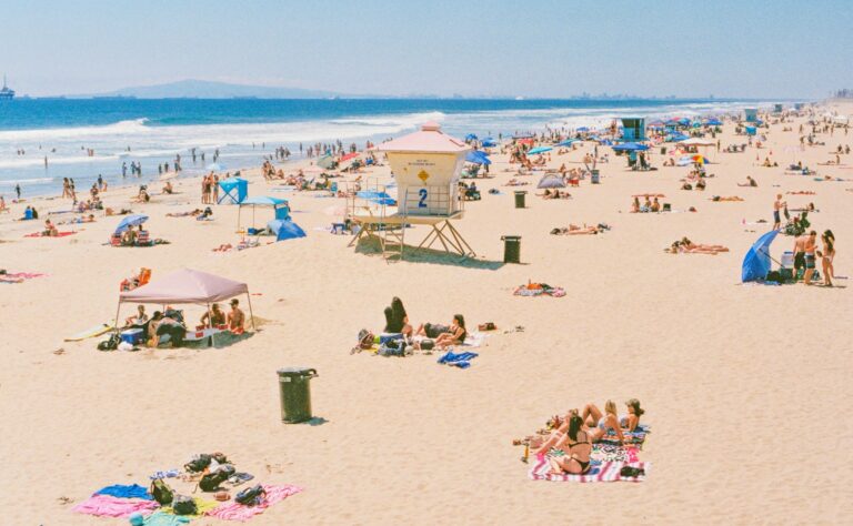 A sunny beach day on the Southern California coast.